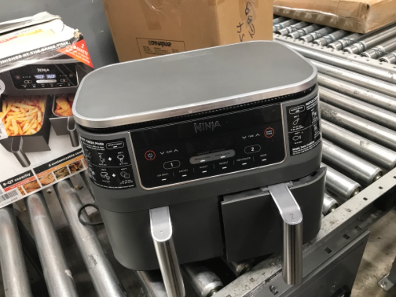 Photo 2 of **USED**
Ninja DZ201 Foodi 8 Quart 6-in-1 DualZone 2-Basket Air Fryer with 2 Independent Frying Baskets, Match Cook & Smart Finish to Roast, Broil, Dehydrate & More for Quick, Easy Meals, Grey