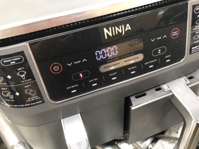 Photo 3 of **USED**
Ninja DZ201 Foodi 8 Quart 6-in-1 DualZone 2-Basket Air Fryer with 2 Independent Frying Baskets, Match Cook & Smart Finish to Roast, Broil, Dehydrate & More for Quick, Easy Meals, Grey