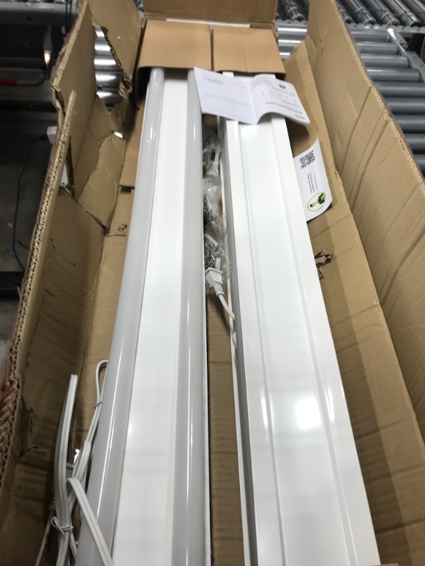 Photo 2 of ***TESTED/ POWERS ON***Sunco Motion Sensor 4ft LED Shop Light, Garage Lights Ceiling LED Plug in Fixtures, 40W, 5000K Daylight, Frosted, Motion Activated, Linkable Suspension Mount, ETL, Energy Star 4 Pack