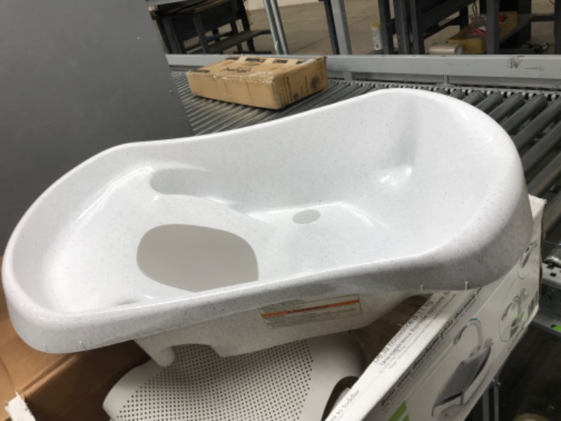 Photo 1 of The First Years Rain Shower Baby Bathtub — Baby Spa for Newborn to Toddler — Includes Convertible Bathtub and Sling with Soothing Spray — Baby Bath Essentials Shower + Tub