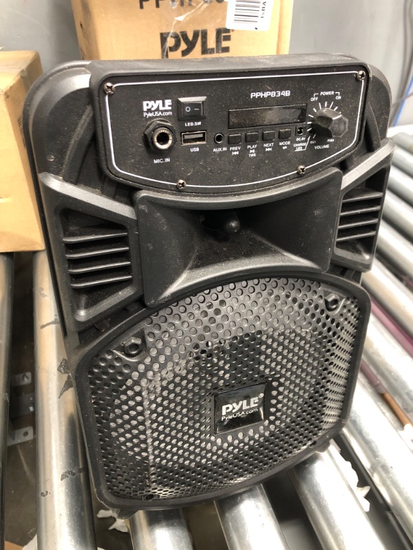Photo 1 of Pyle Portable Bluetooth PA Speaker System-300W Rechargeable Indoor/Outdoor Bluetooth Speaker Portable System w/ 8” Subwoofer 1” Tweeter, Microphone in, Party Lights, MP3/USB, Radio, Remote PPHP834B
