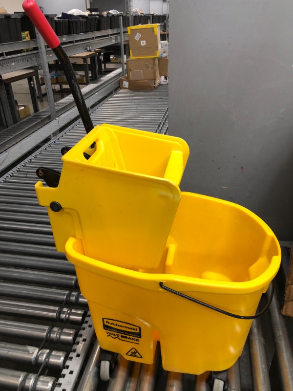 Photo 2 of **MINOR TEAR & WEAR**Rubbermaid Commercial Products, WaveBrake - Commercial Industrial Mop Bucket with Side-Press Wringer Combo on Wheels, 35 Quart, Yellow Yellow Bucket and Wringer