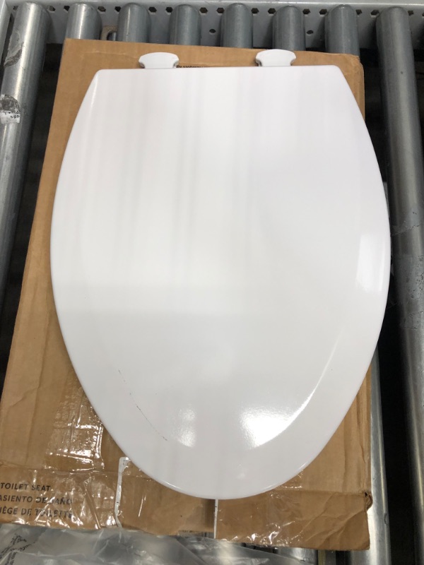 Photo 2 of **MINOR SHIPPING DAMAGE**Bemis 1500EC 390 Toilet Seat with Easy Clean & Change Hinges, Elongated, Durable Enameled Wood, Cotton White Cotton White 1 Pack Elongated Toilet Seat