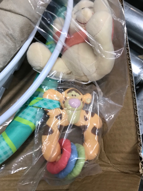 Photo 1 of Bright Starts Winnie the Pooh Dots & Hunny Pots Baby Bouncer with Vibrating Infant Seat, Music & 3 Playtime Toys, 23x19x23 Inch
