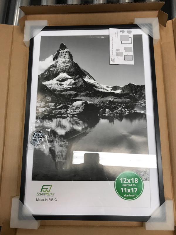 Photo 1 of FrameWorks 12”x18” Matted to 11”x17” – Deluxe Black Aluminum Contemporary Picture Frame with Tempered Glass and Removable Mat Black 12"x18" matted to 11"x17"