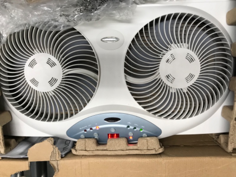 Photo 3 of **NON-FUNCTIONAL***   Bionaire Window Fan with Twin 8.5-Inch Reversible Airflow Blades and Remote Control, White White 2 Blades Electronic control with LCD screen Window Fan