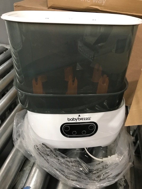 Photo 1 of *** POWERS ON *** Baby Brezza Baby Bottle Sterilizer and Dryer Advanced – Electric Steam Sterilization Machine – Universal Sterilizing for All Bottles: Plastic + Glass + Pacifiers + Breast Pump Parts - HEPA Filtration
