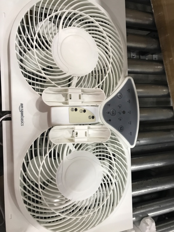 Photo 3 of ***POWERS ON*** Comfort Zone CZ310R 9" 3-Speed, 3-Function, Expandable, Reversible Twin Window Fan with Remote Control, Removable Cover
