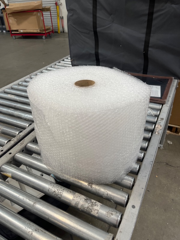 Photo 2 of Amazon Basics Perforated Bubble Cushioning Wrap - Small 3/16", 12-Inch x 175-Foot Long Roll Bubble Wrap