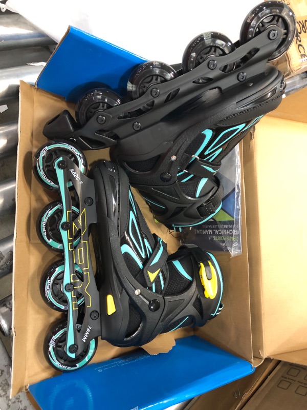 Photo 2 of 2PM SPORTS Vinal Girls Adjustable Flashing Inline Skates, All Wheels Light Up, Fun Illuminating Skates for Kids and Men- Azure Small (1Y-4Y US) Cyan & Yellow Small - Little Kid (11C-1 US)