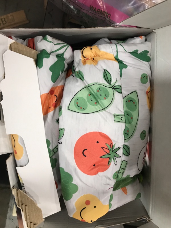 Photo 2 of Boppy Shopping Cart and High Chair Cover, Multi-color Farmers Market Veggies, with Changeable SlideLine Carrot Toy, Plush Comfort with 2-point Safety Belt, Wipeable and Machine Washable, 6-48 Months