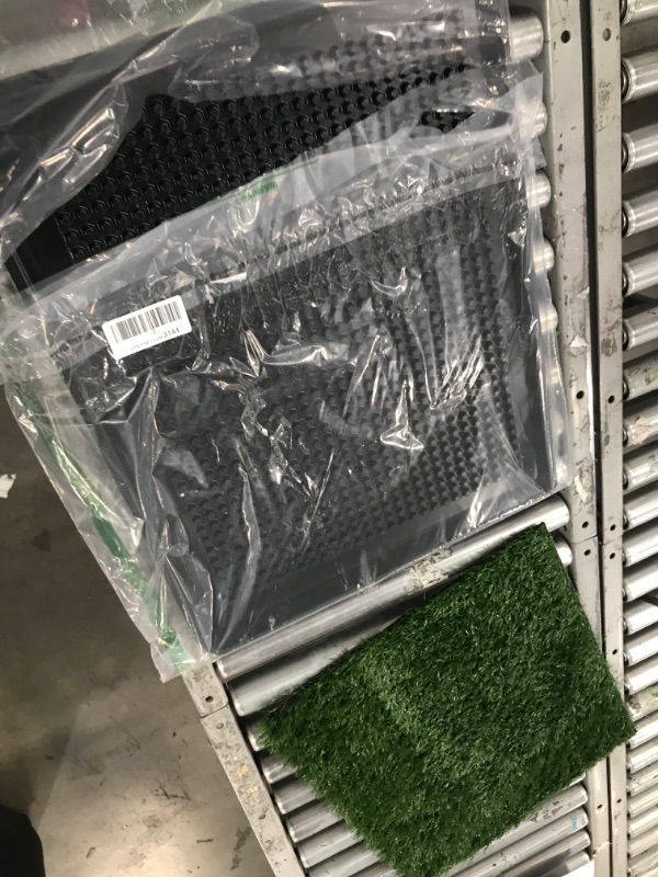 Photo 1 of 19"x22" dog training pad with fake grass 