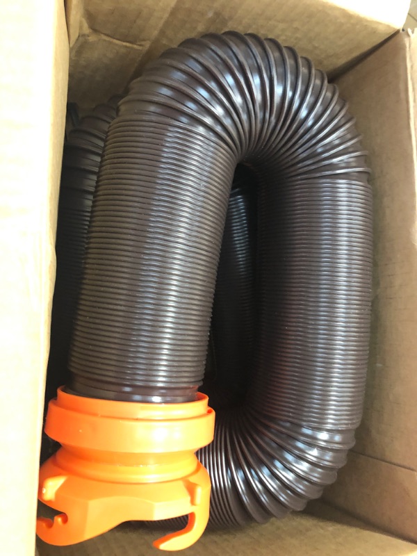 Photo 2 of Camco RhinoFLEX RV Sewer Hose Kit with Swivel Transparent Elbow and 4-in-1 Dump Station Fitting, Brown, 15 Feet (39770) 15ft Sewer Hose Kit Frustration-Free Packaging