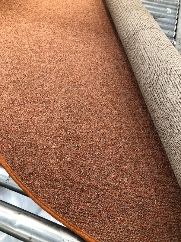 Photo 1 of 5' ROUND RUG ORANGE/BROWN 