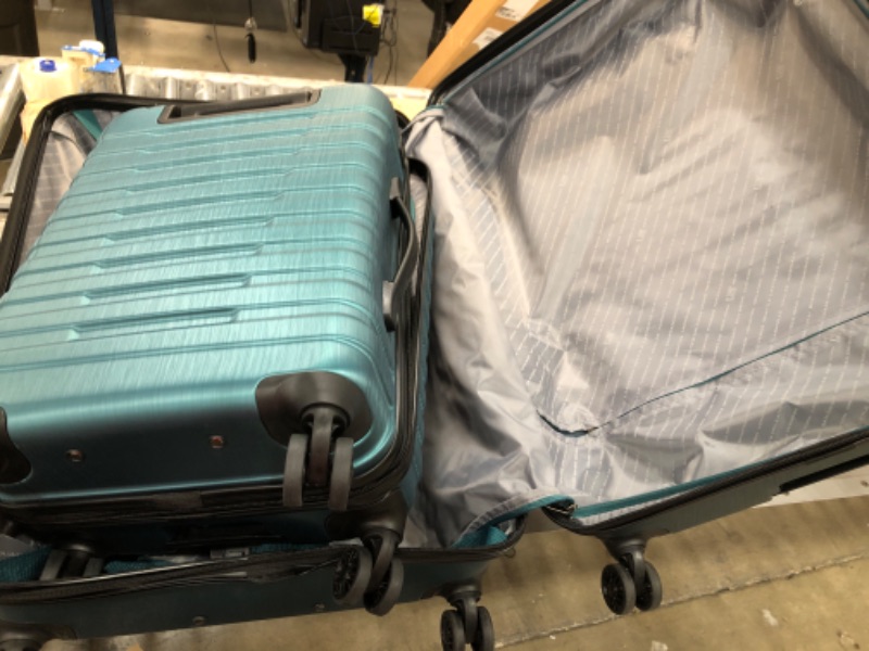 Photo 2 of **LARGEST SUITCASE DAMAGED***  U.S. Traveler Boren Polycarbonate Hardside Rugged Travel Suitcase Luggage with 8 Spinner Wheels, Aluminum Handle, Teal, 2-Piece Set, USB Port in Carry-On 2-Piece Set, USB Port in Carry-On Teal