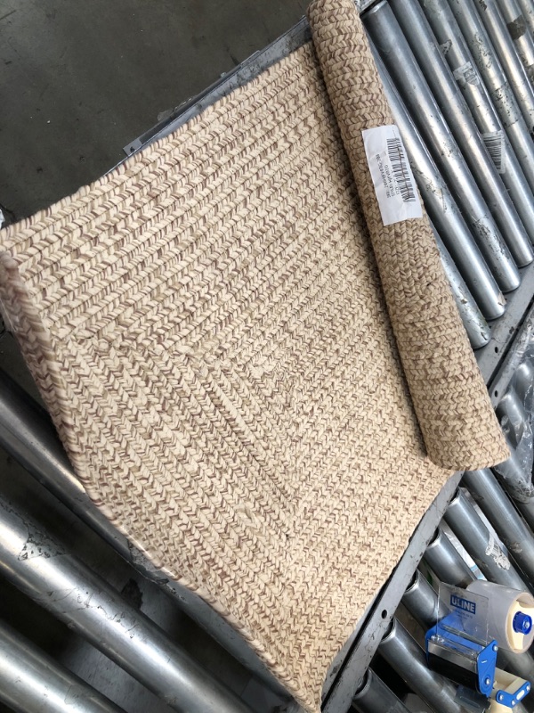 Photo 1 of **used item**
Lefebvre Casual Braided Tan 2 ft. x 3 ft. Indoor/Outdoor Patio Area Rug
