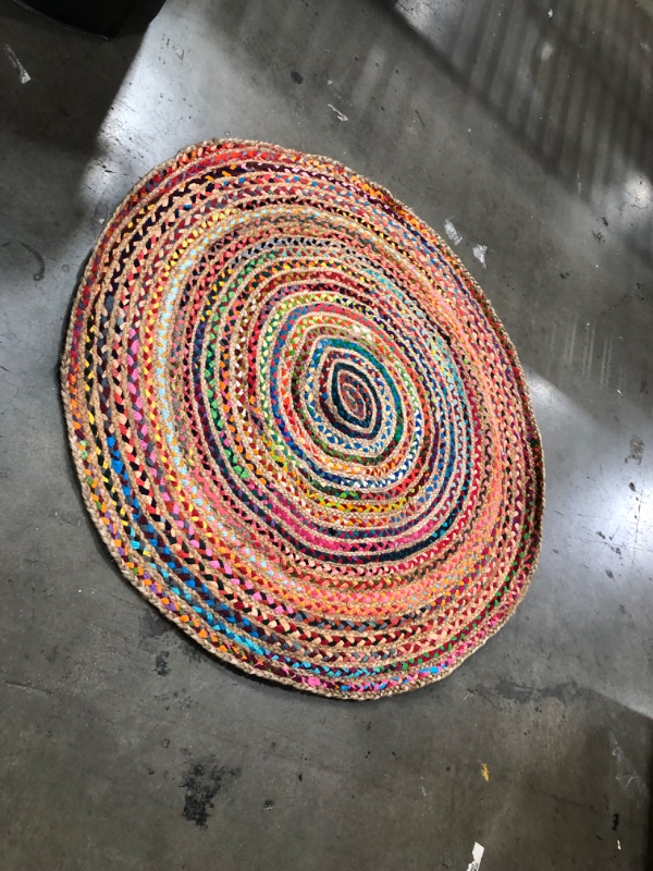 Photo 2 of **used item**
50in round rainbow style rug