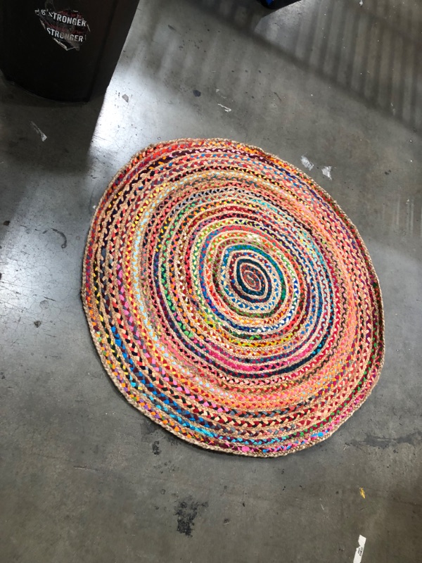 Photo 1 of **used item**
50in round rainbow style rug