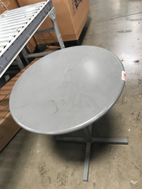 Photo 1 of 24" ROUND METAL TABLE 30" HIGH 