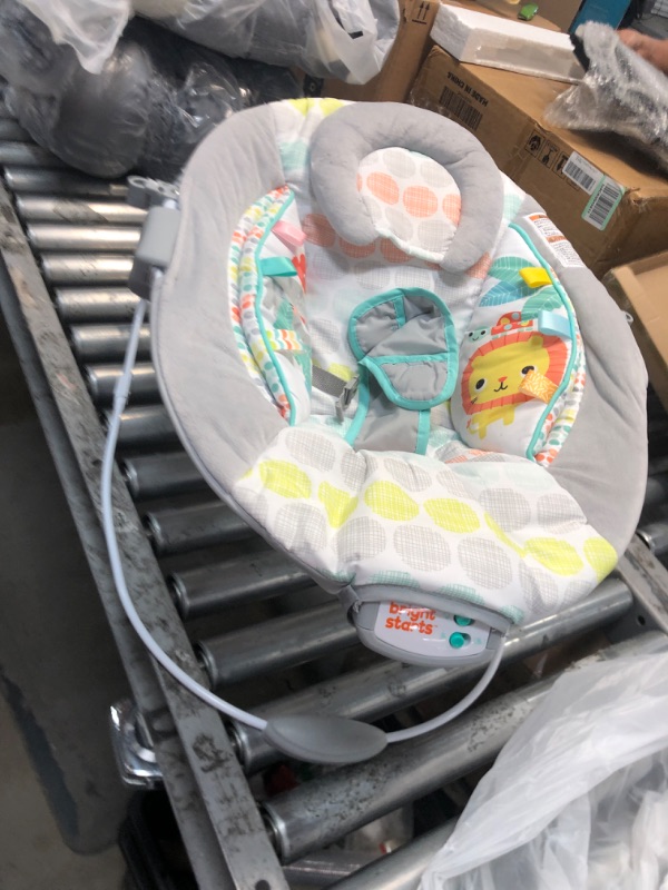 Photo 2 of Bright Starts Happy Safari Vibrating Baby Bouncer Seat with 3-Point Harness and Toy Bar, Age 0-6 Months