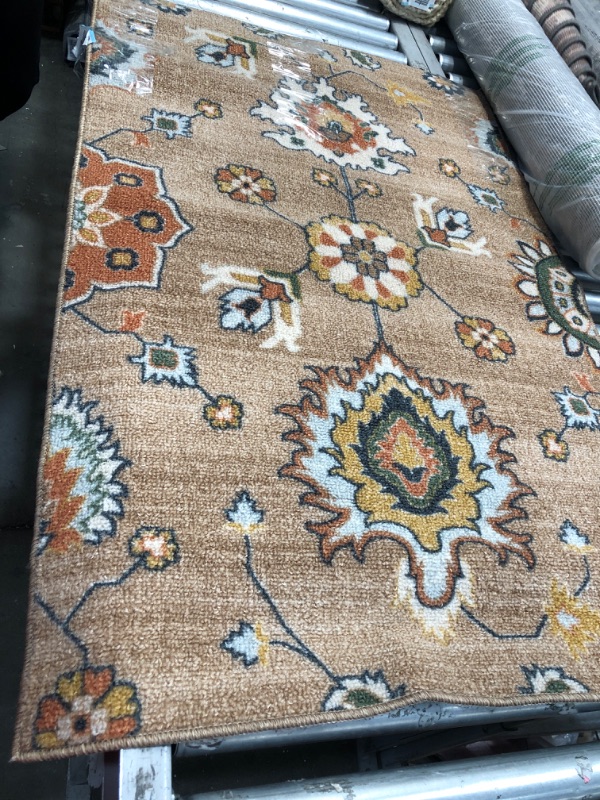 Photo 1 of 4ft tan orange home rug 