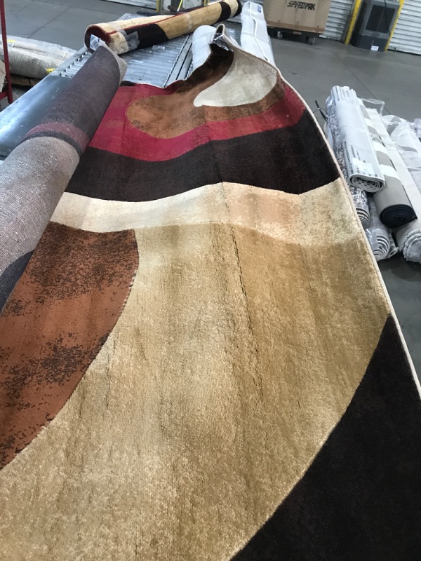 Photo 2 of 8x10ft area rug brown swirl