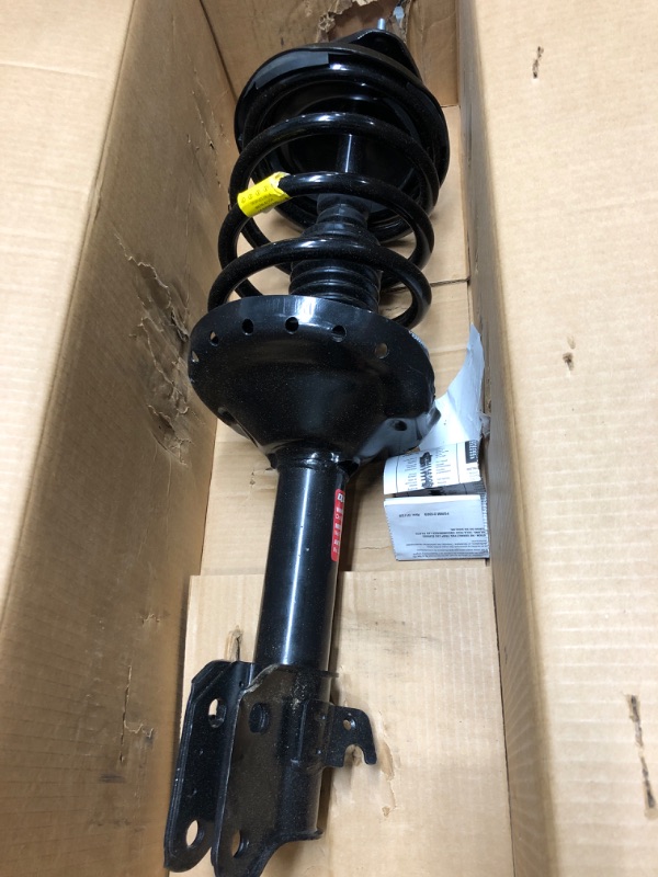 Photo 1 of Monroe Shocks & Struts Quick-Strut 272687 Strut and Coil Spring Assembly