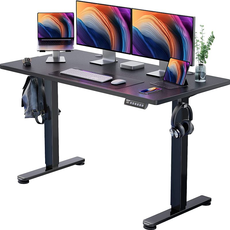 Photo 1 of ErGear Height Adjustable Electric Standing Desk, 55 x 28 Inches Sit Stand up Desk, Memory Computer Home Office Desk (Black)
