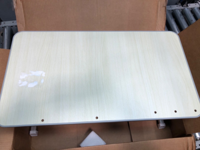 Photo 2 of 
Amazon Basics Adjustable Laptop Tray Table - Lap Desk Fits up to 17-Inch Laptop - Medium, 12"x20