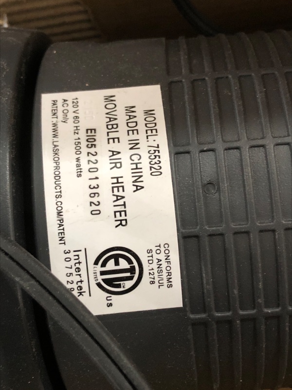 Photo 1 of Lasko 1500W Digital Ceramic Space Heater with Remote, 755320, Silver