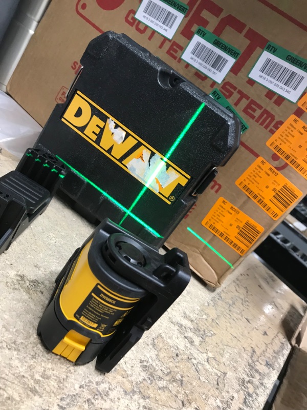 Photo 2 of 100 ft. Green Self-Leveling Cross Line Laser Level with (3) AA Batteries & Case
