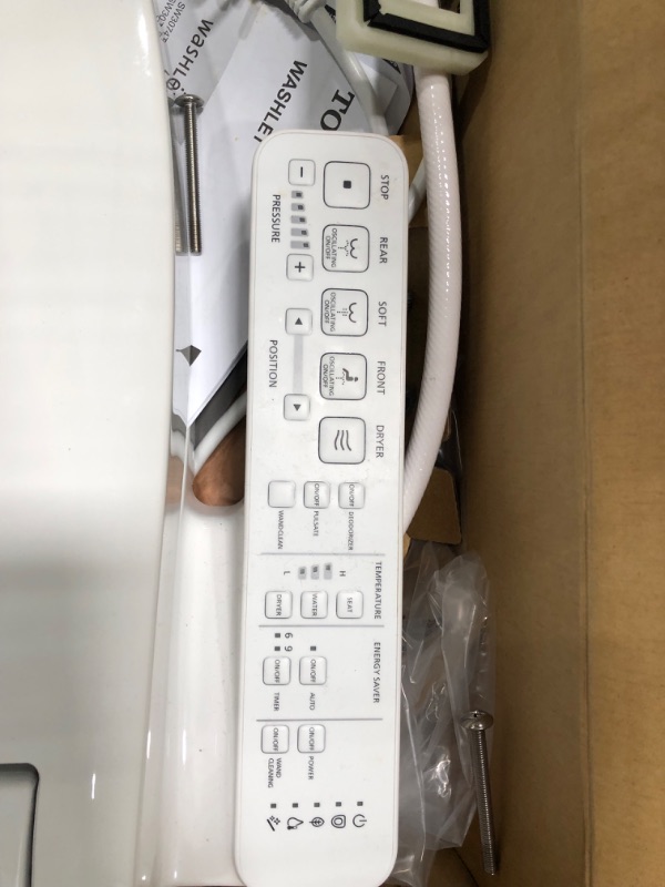 Photo 4 of **box has been opened**
TOTO SW3074#01 WASHLET C2 Electronic Bidet Toilet Seat with PREMIST and EWATER+ Wand Cleaning, Elongated, Cotton White C2 Elongated Cotton White