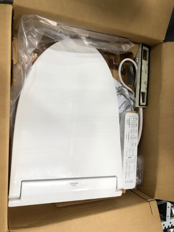 Photo 3 of **box has been opened**
TOTO SW3074#01 WASHLET C2 Electronic Bidet Toilet Seat with PREMIST and EWATER+ Wand Cleaning, Elongated, Cotton White C2 Elongated Cotton White
