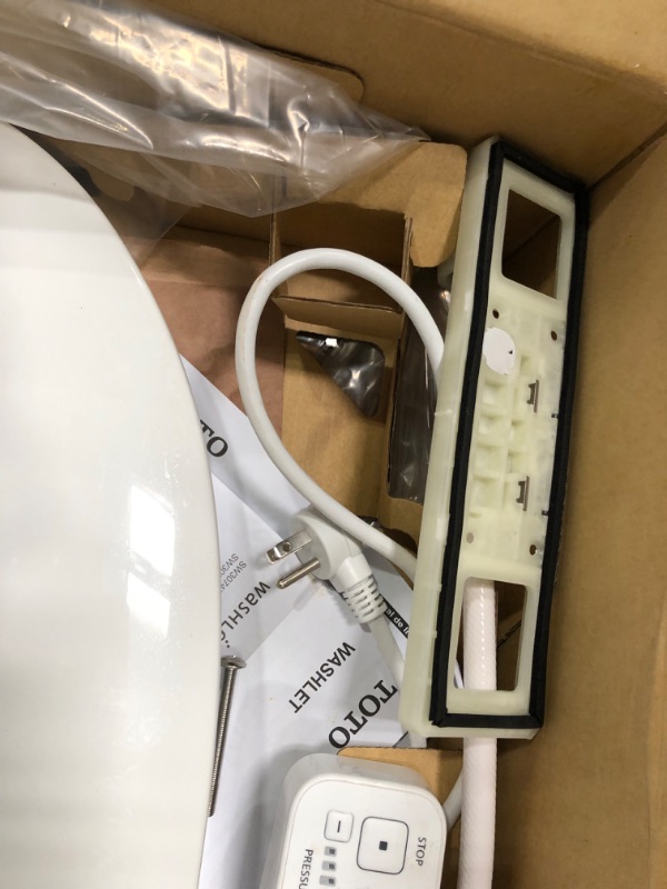 Photo 2 of **box has been opened**
TOTO SW3074#01 WASHLET C2 Electronic Bidet Toilet Seat with PREMIST and EWATER+ Wand Cleaning, Elongated, Cotton White C2 Elongated Cotton White