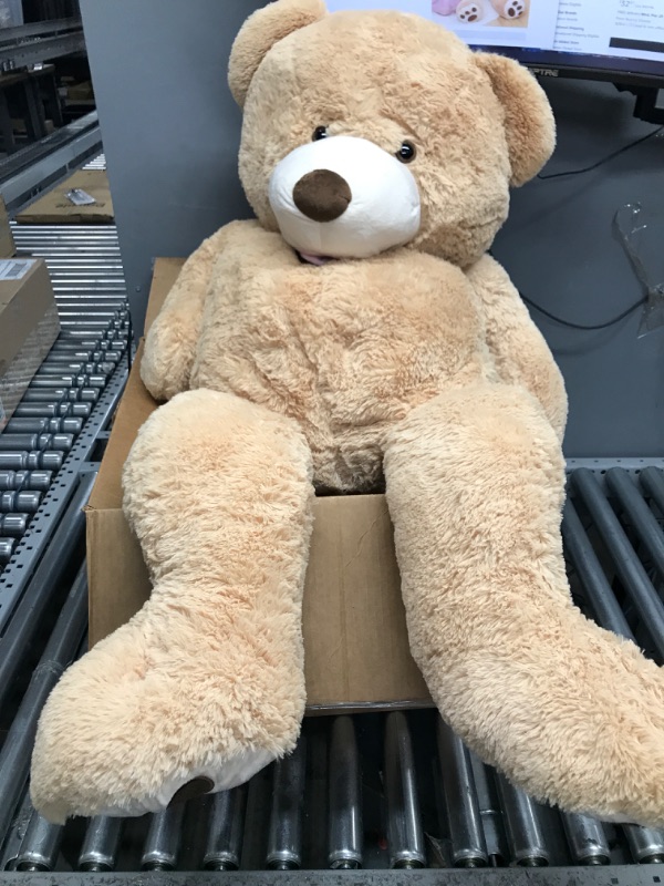 Photo 1 of DOLDOA Big Teddy Bear Stuffed Animals with Footprints Plush Toy for Girlfriend 51 inch (Brown)