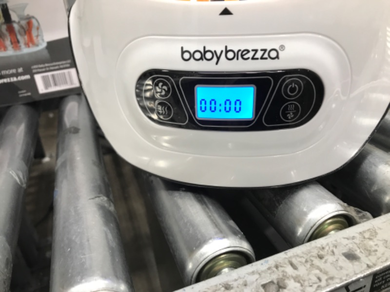 Photo 2 of Baby Brezza Baby Bottle Sterilizer and Dryer Machine – Electric Steam Sterilization - Universal Fit - Pacifiers, Glass, Plastic, and Newborn Feeding Bottles