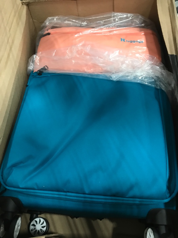 Photo 2 of it luggage Duo-Tone 27" Softside Checked 8 Wheel Spinner, Peach/Sea Teal 27" Peach / Sea Teal