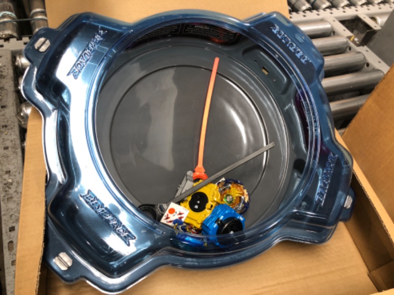 Photo 2 of BEYBLADE Burst Pro Series Evo Elite Champions Pro Set -- Complete Battle Game Set with Beystadium, 2 Battling Top Toys and 2 Launchers Frustration-Free Packaging