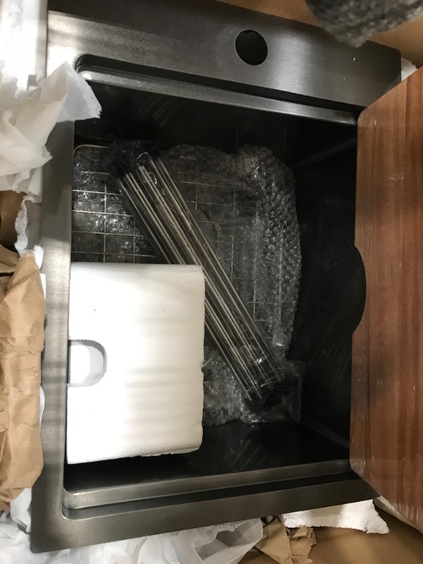Photo 2 of **No info found**
Black stainless steel kitchen sink, with wood cover