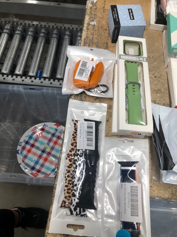 Photo 1 of Assorted Apple Watch bands, and AirPods case