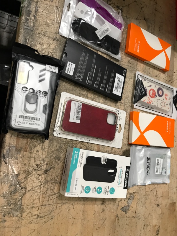 Photo 1 of MISCELLANEOUS BUNDLE OF ASSORTED PHONES CASES