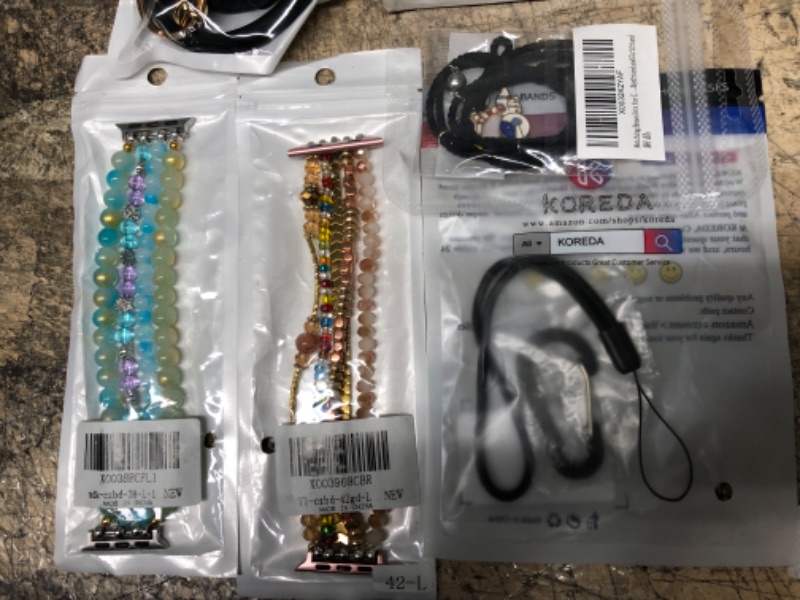 Photo 4 of ASSORTED BAG OF ACCESSORIES FOR PHONE/GALAXYWATCH5PROTECTOR/EAR HOOKS - 14 ITEMS