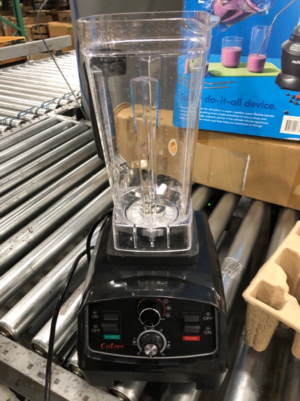 Photo 2 of ***POWERS ON***COLZER Professional Countertop Blender with 2200-Watt Base, Smoothie Blender ,Built-in Timer ,High Power Blender 2L Cups for Frozen Drinks ,Shakes and Smoothies