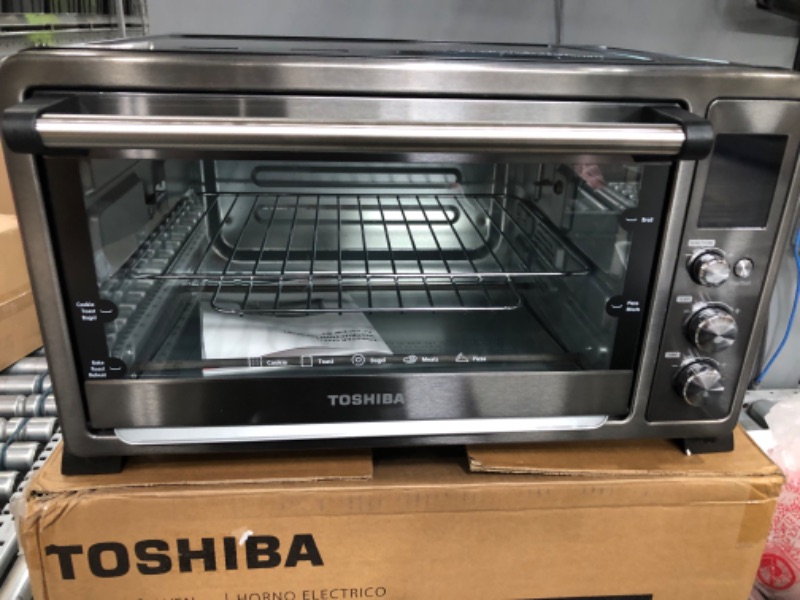 Photo 1 of TOSHIBA AC25CEW-BS Large 6-Slice Convection Toaster Oven Countertop, 10-In-One with Toast, Pizza and Rotisserie, 1500W, Black Stainless Steel
