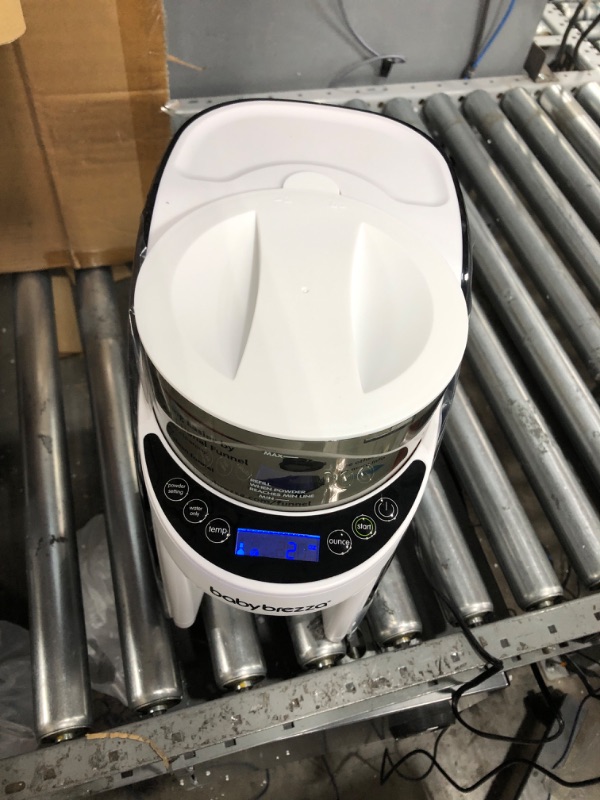 Photo 2 of ***Missing hardware***New and Improved Baby Brezza Formula Pro Advanced Formula Dispenser Machine - Automatically Mix a Warm Formula Bottle Instantly - Easily Make Bottle with Automatic Powder Blending