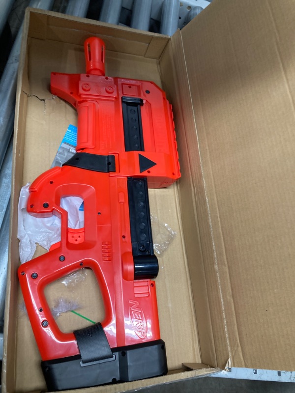 Photo 2 of **TESTED AND FUNCTIONAL**
NERF Fortnite Compact SMG Motorized Blaster, Ultra Red Wrap Design, 8-Dart Internal Clip, 8 Elite Foam Darts, Electric Semi Auto Fortnite Toy Blaster