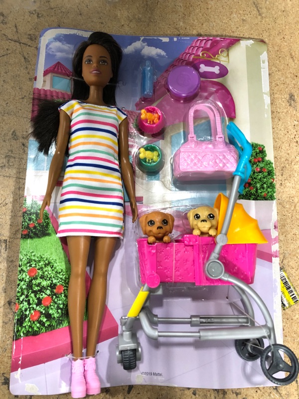 Photo 2 of Barbie Stroll ‘n Play Pups Playset with Brunette Doll (11.5-inch), 2 Puppies, Pet Stroller and Accessories, Gift for 3 to 7 Year Olds , Pink