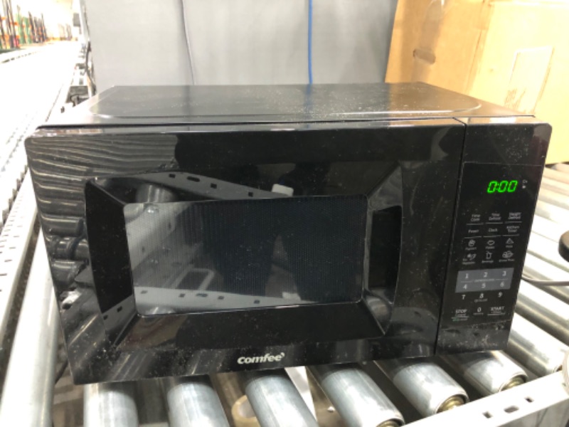 Photo 6 of  USED. COMFEE' EM720CPL-PMB Countertop Microwave Oven with Sound On/Off, ECO Mode and Easy One-Touch Buttons, 0.7cu.ft, 700W, Black Black Microwave