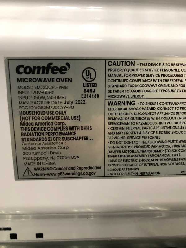 Photo 2 of  USED. COMFEE' EM720CPL-PMB Countertop Microwave Oven with Sound On/Off, ECO Mode and Easy One-Touch Buttons, 0.7cu.ft, 700W, Black Black Microwave