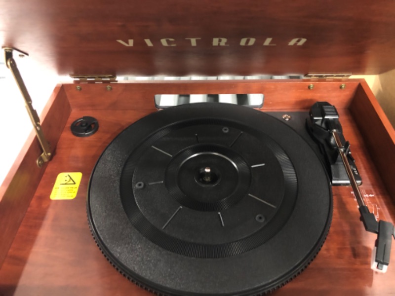 Photo 1 of Victrola Nostalgic 6-in-1 Bluetooth Record Player & Multimedia Center with Built-in Speakers - 3-Speed Turntable, CD & Cassette Player, FM Radio | Wireless Music Streaming | Mahogany
